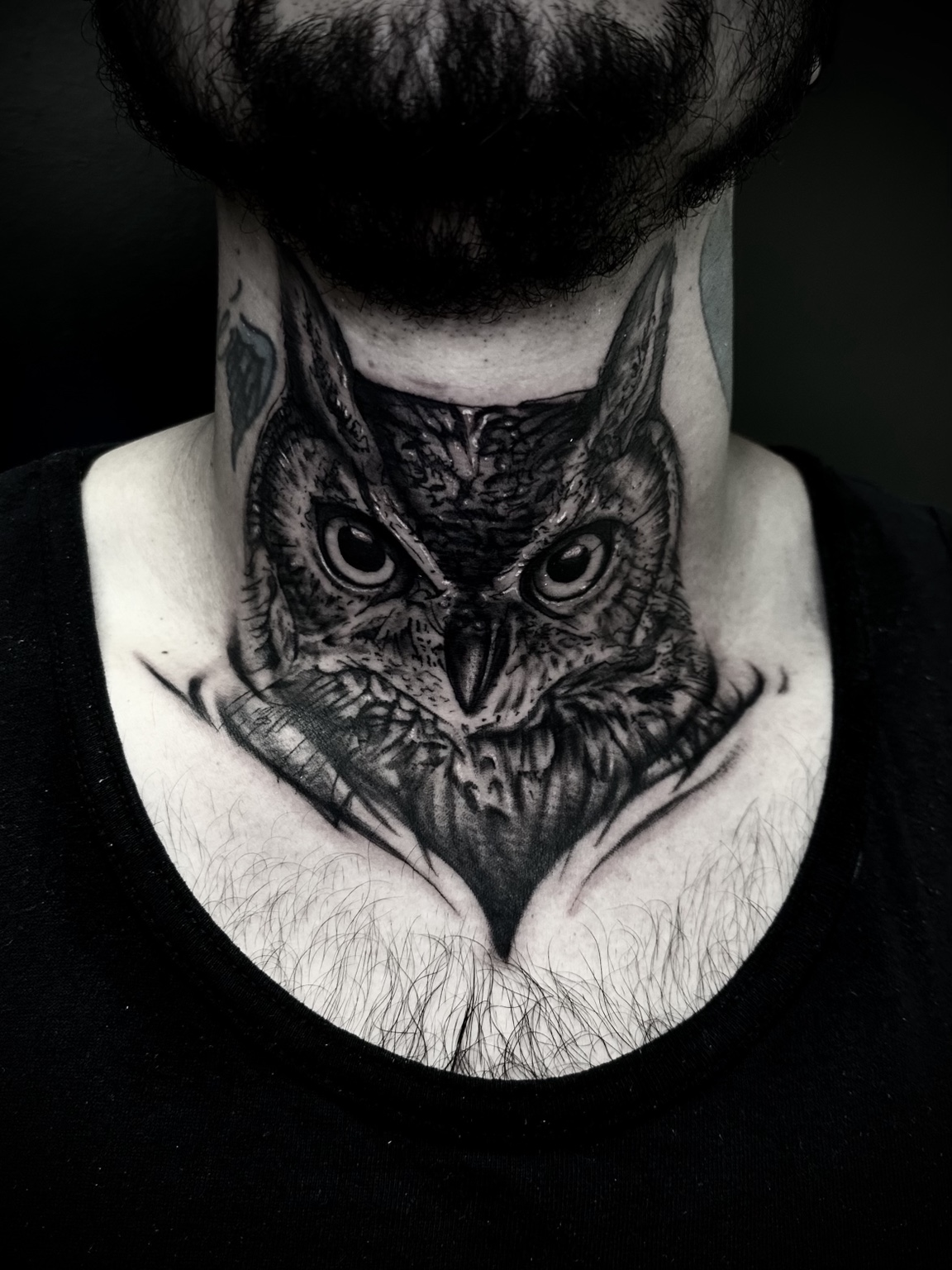 Owl chest tattoo